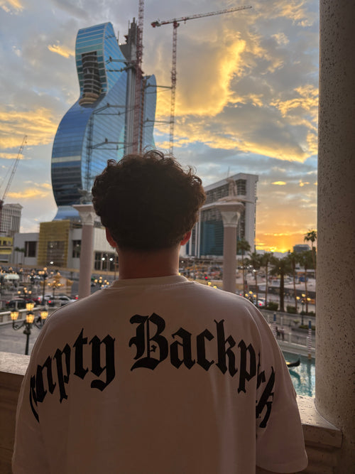 Empty Backpack — White Drop-Shoulder Tee